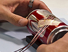 Strain gage attached to a pop can