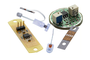 four custom strain gages and hybrid sensors