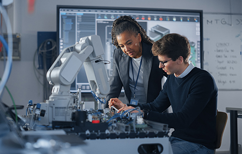 teacher and student with robot arm