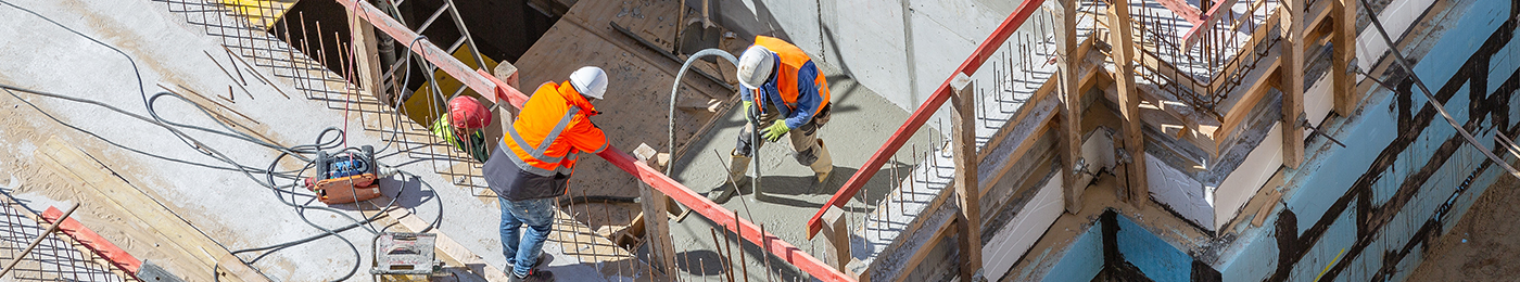 engineers at a construction site during a concrete pour