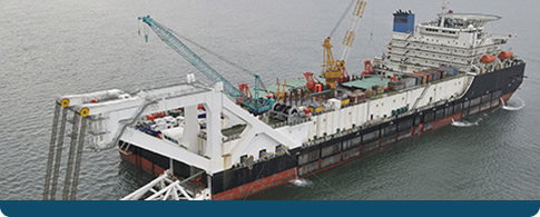 A tanker ship with winch and cranes