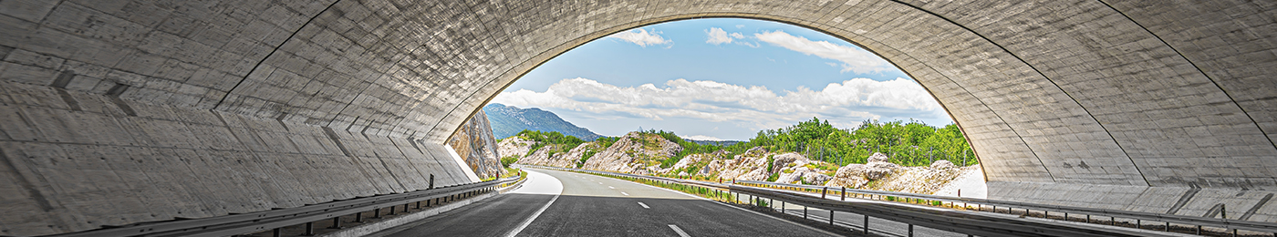 Tunnel structure over a road