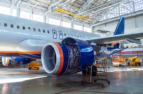 Civil aircraft on maintenance of engine and fuselage repair in hangar